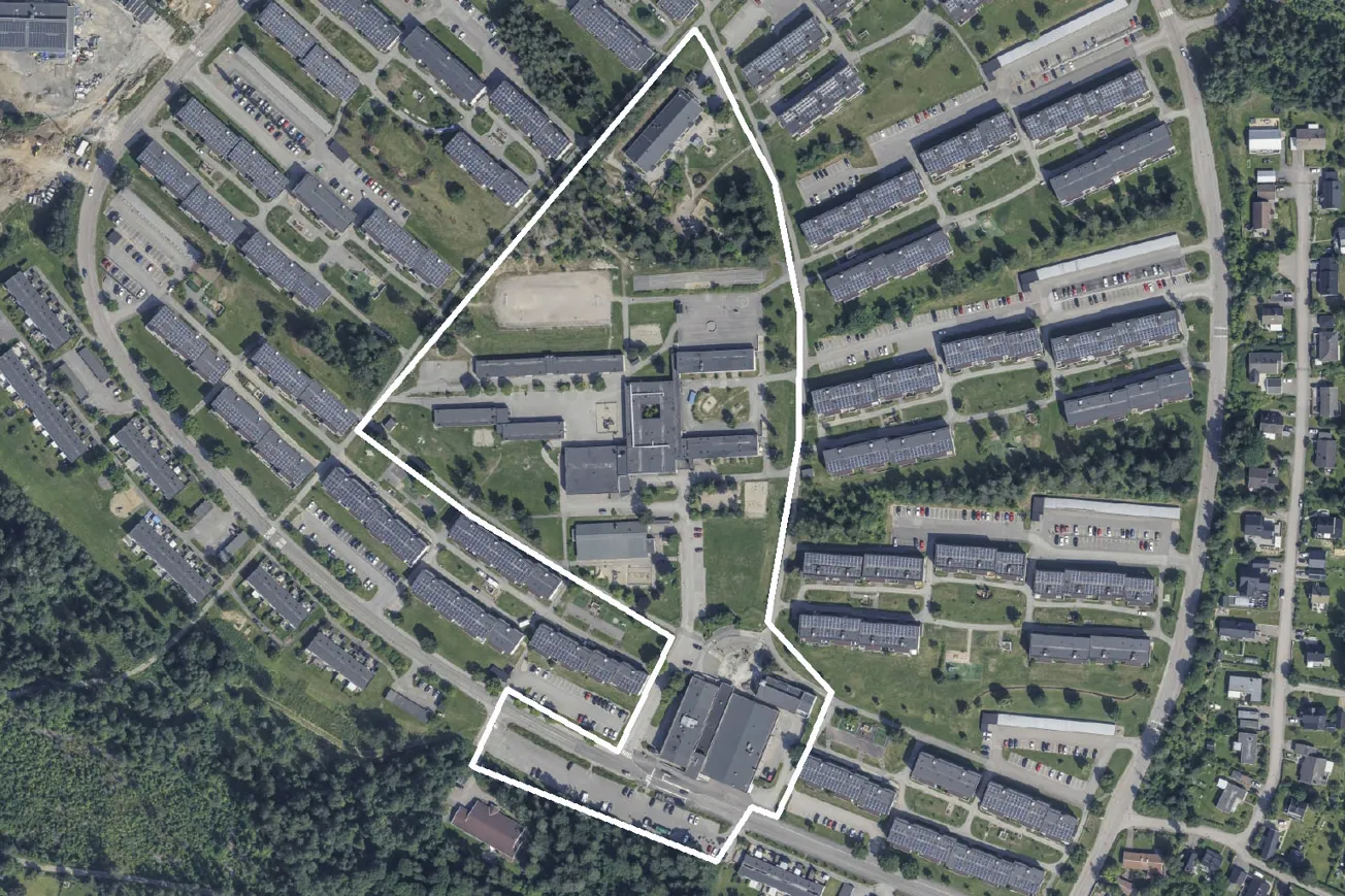 Flygbild där Bosvedjans centrum är utmarkerat i bildens mitt. Foto: Sundsvalls kommun.